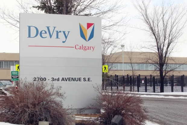 The DeVry Calgary campus sign on a winter day.